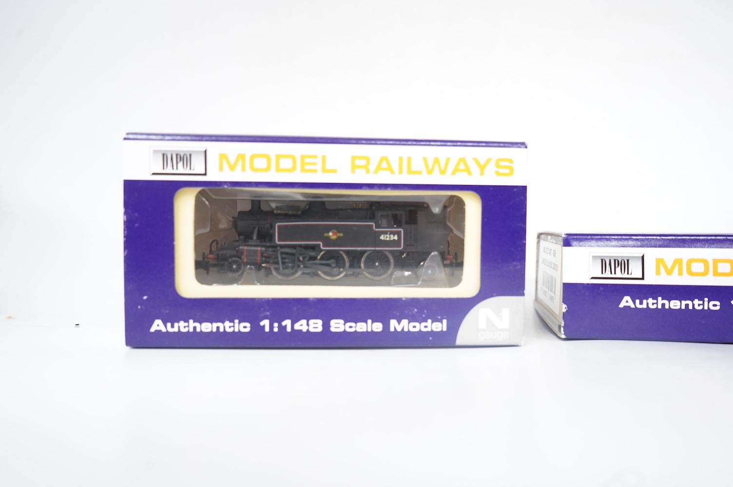 Four boxed Dapol N gauge railway BR locomotives; two Class M7, 30031 (ND-025) and 30128 (ND-045), together with two Ivatt 2-6-2T, 41234 (ND-061A) and 41258 (ND-061B). Condition - good.